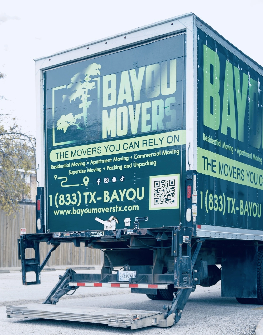 Rear of a Bayou Movers truck ready for loading