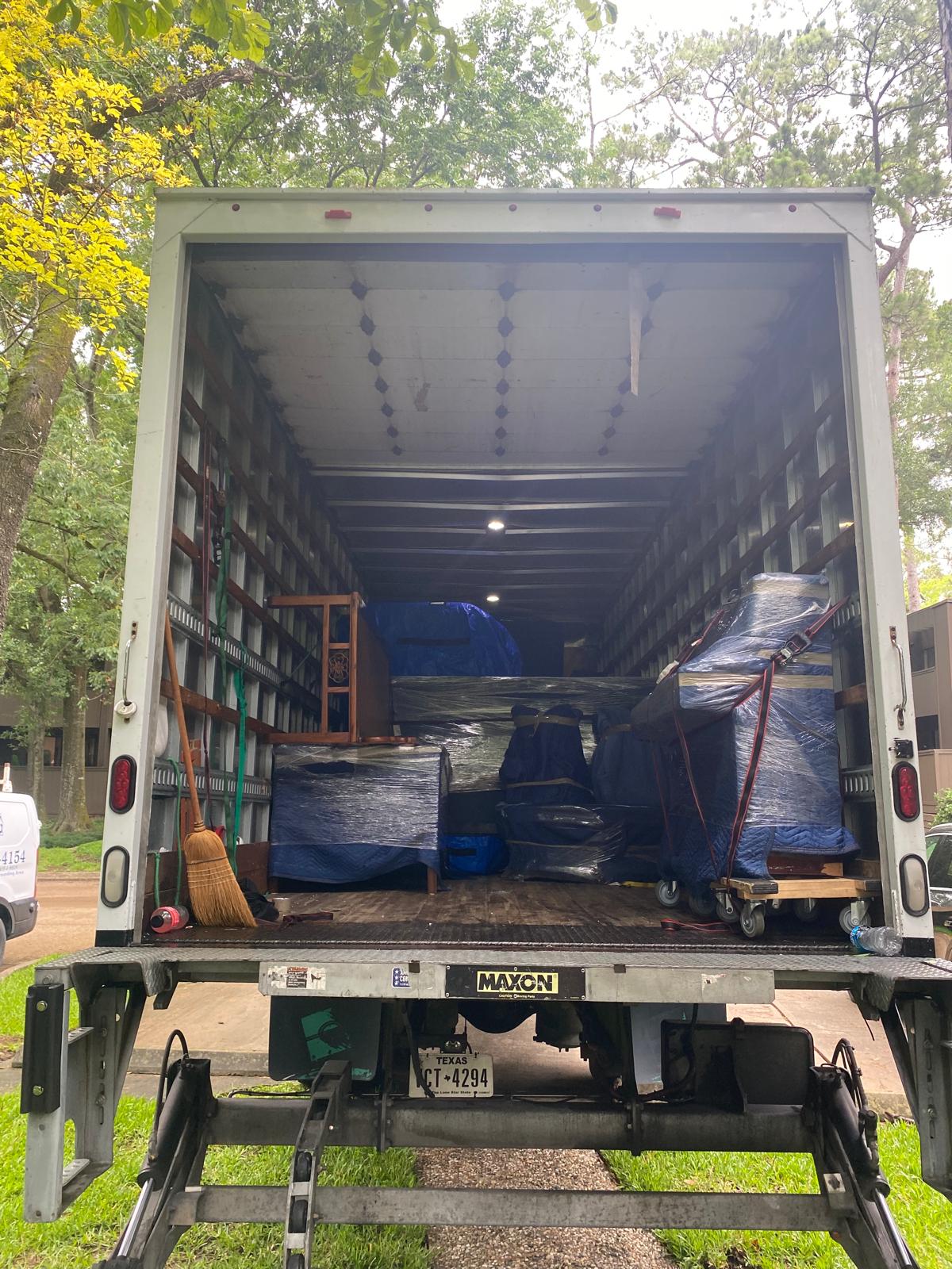 Protected furniture loaded inside a Bayou Movers truck