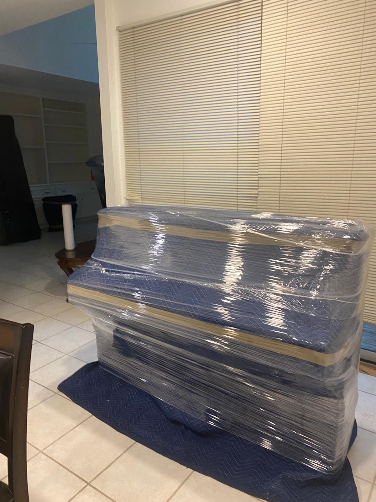 Bayou Movers packing and protecting household items before a move