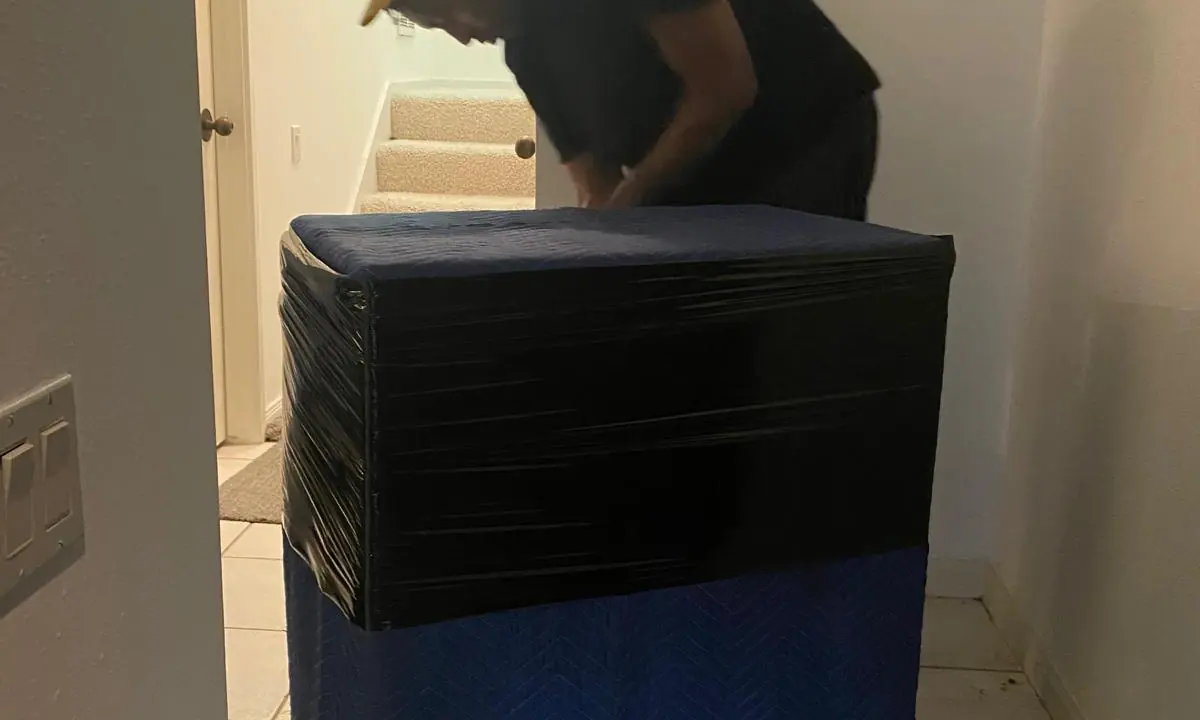 Protected and wrapped furniture prepared for a Bayou Movers move in Spring Branch, Texas