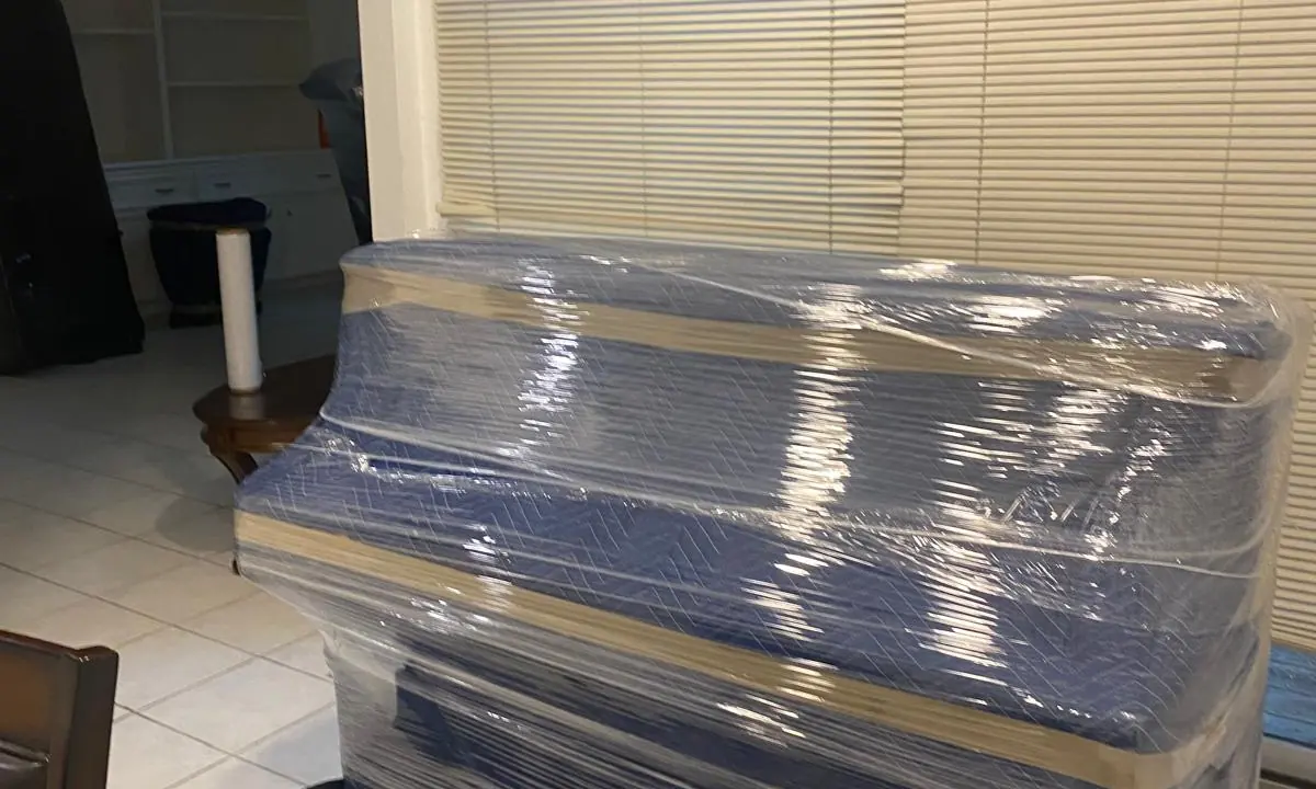 Protected and wrapped furniture prepared for a Bayou Movers move in Katy, Texas